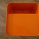 Vintage orange plastic dessert set from the 1970s.