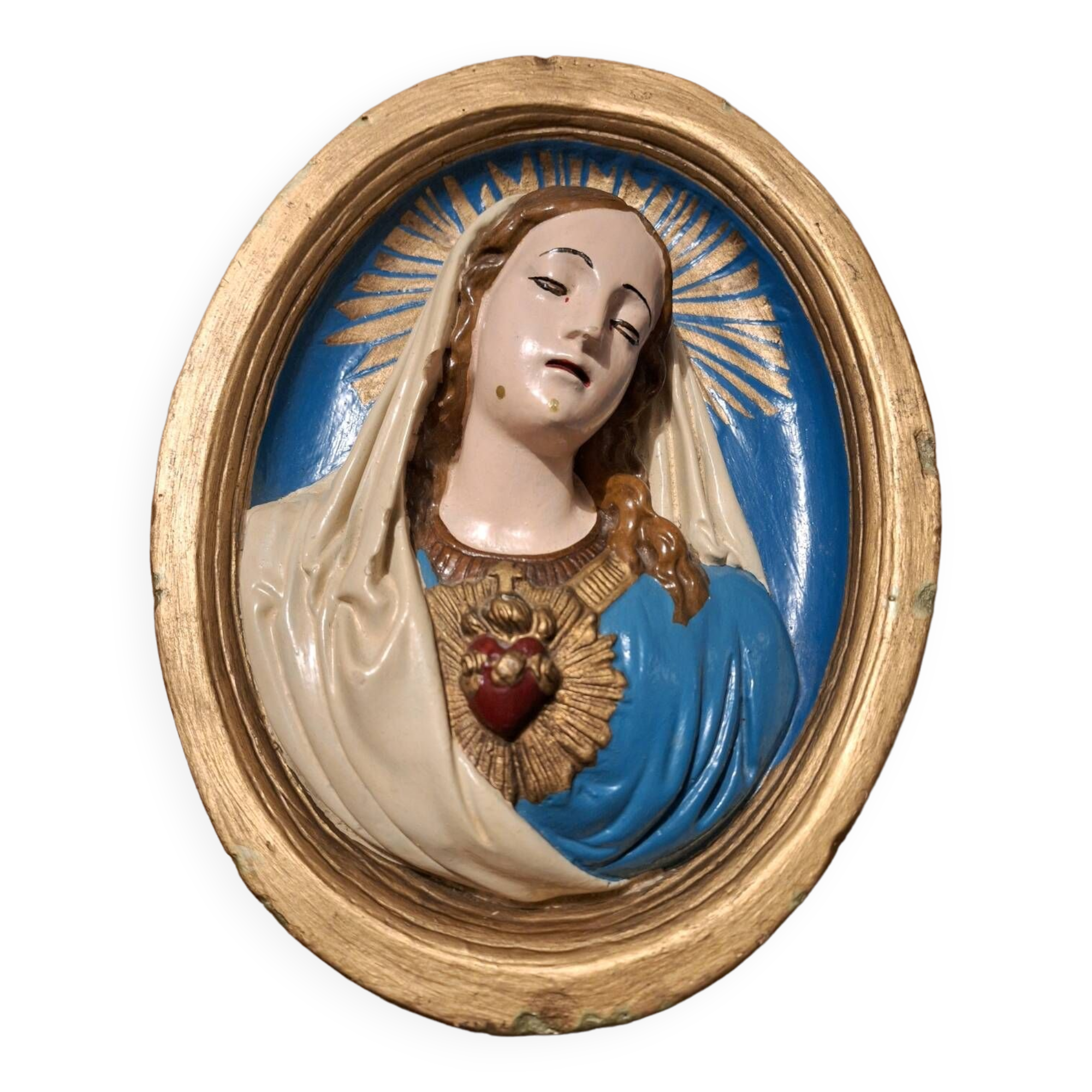 Vintage plaster frame of the Virgin, old religious painting