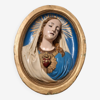 Vintage frame of the Virgin in plaster, old religious painting