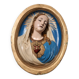 Vintage frame of the Virgin in plaster, old religious painting