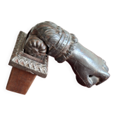 Cast iron door knocker from the 19th century or earlier.