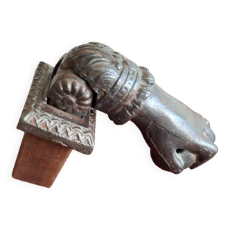 Cast iron door knocker from the 19th century or earlier.