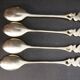 Small golden spoons with punch