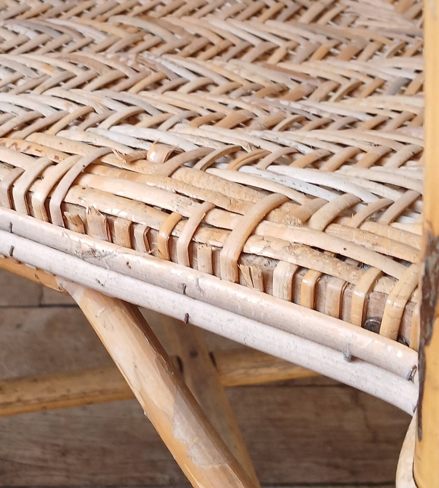 High-backed adult rattan armchair, circa 1960