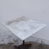 Bistro pedestal table in marble and cast iron lion paws