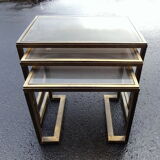 Pull-out tables in brass