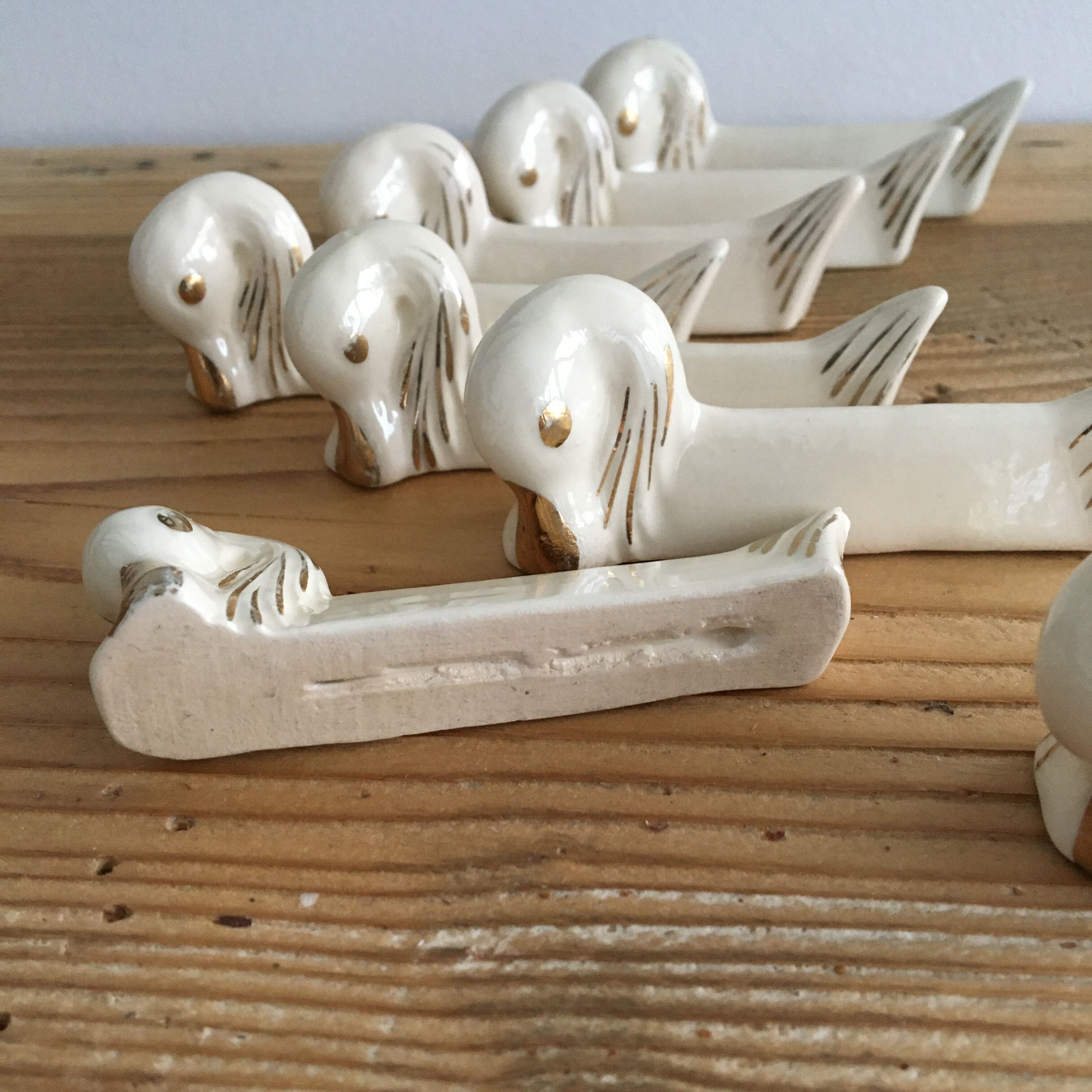 Set of 8 ceramic swan knife holders 50s