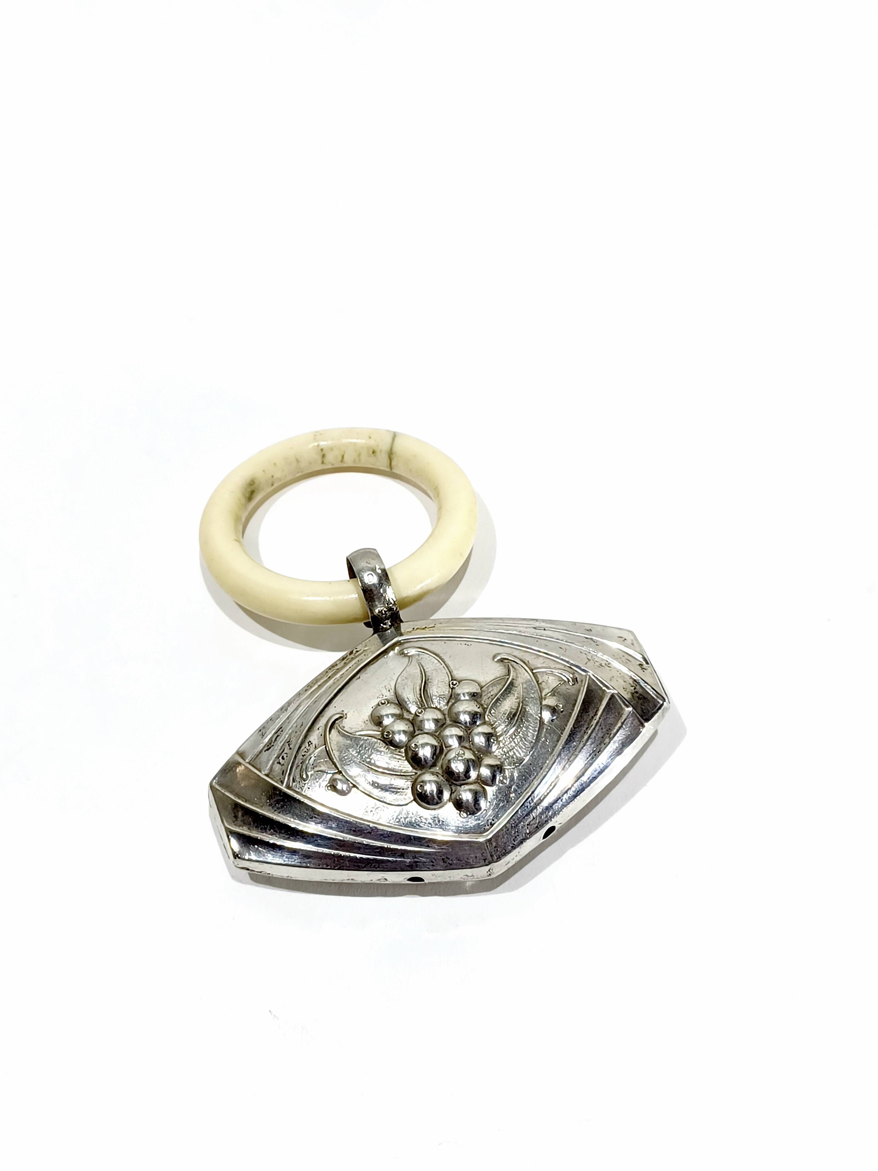 Solid silver rattle