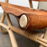 Mid-century safari lounge chair in bamboo and Danish leather, 1960s.