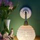 Vintage pink Clichy glass globe wall light.