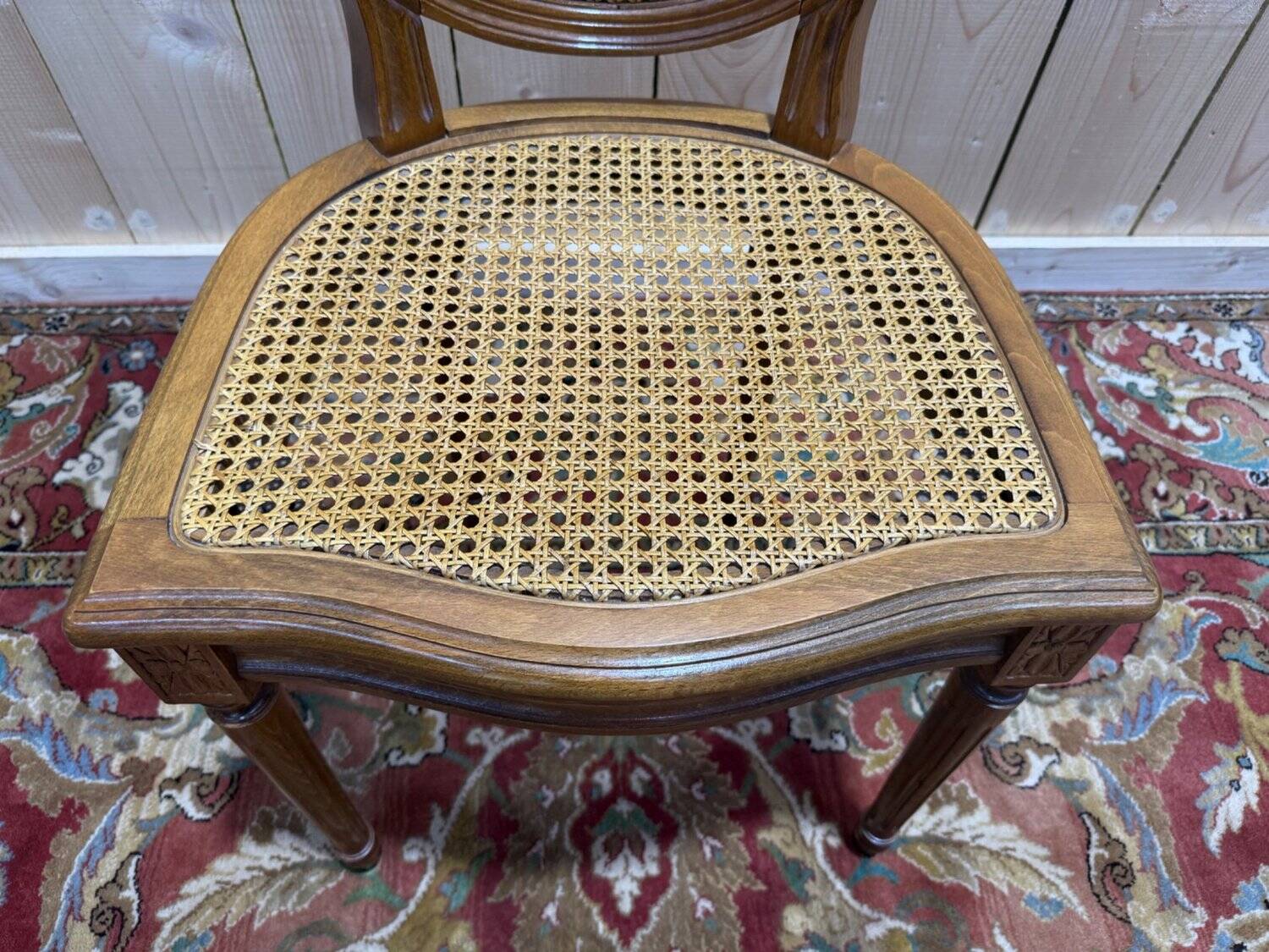 Set of 6 Louis XVI medallion chairs with caning.