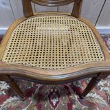 Set of 6 Louis XVI medallion chairs with caning.