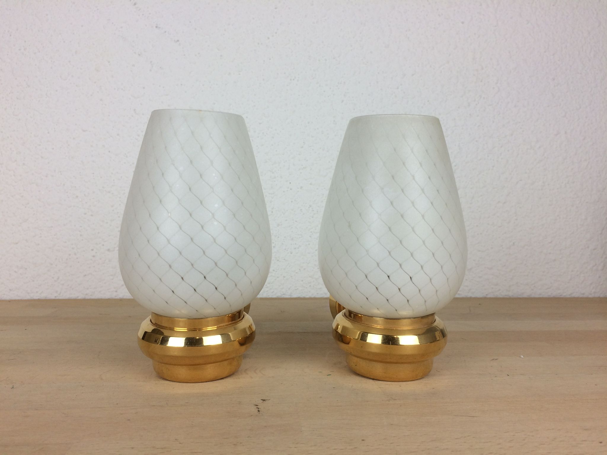 Pair of solid brass and white opaline wall lamps