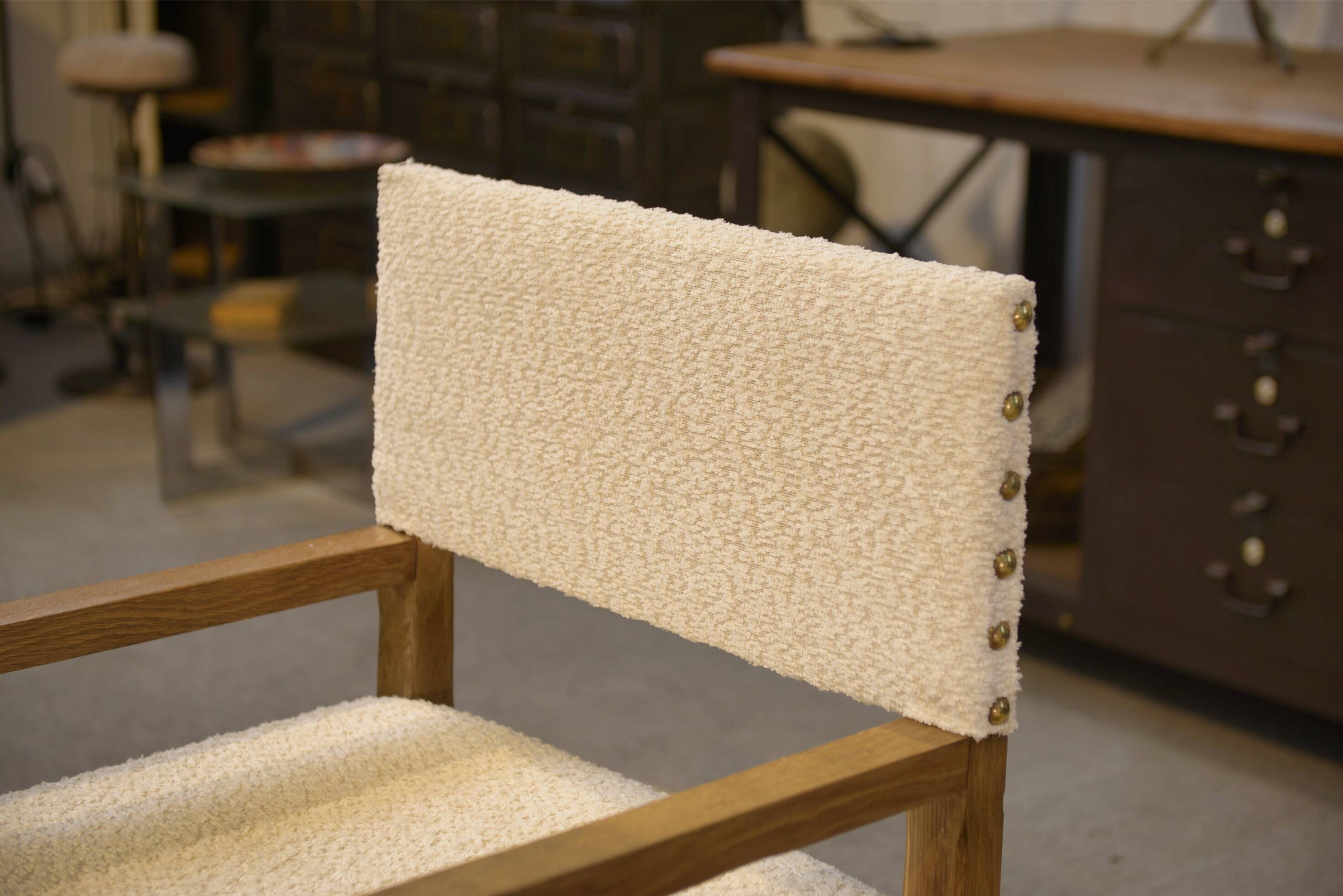 Pair of brutalist armchairs in oak and cream boucle 1950s