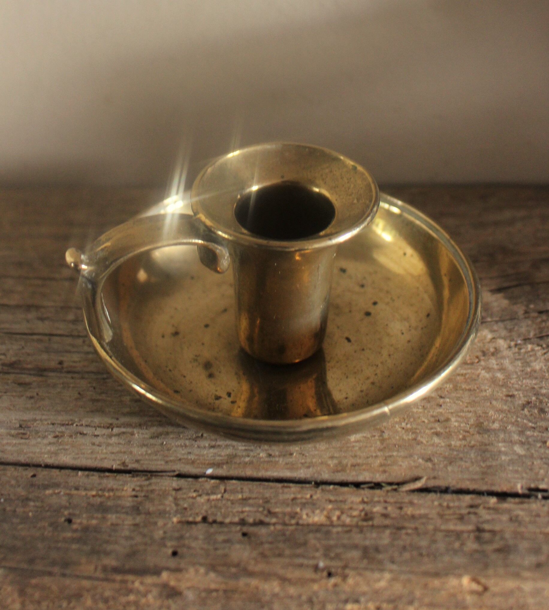 Cave rat brass candle holder