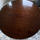Table style empire en noyer massif