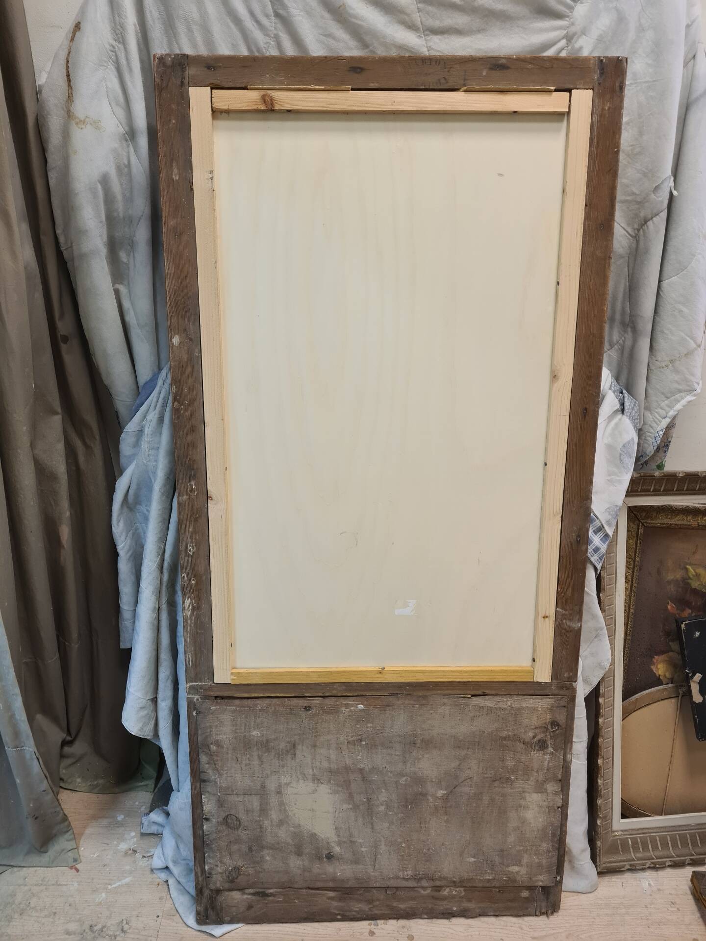 19th-century gilded trumeau mirror with restaurant slate.