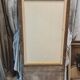 19th-century gilded trumeau mirror with restaurant slate.