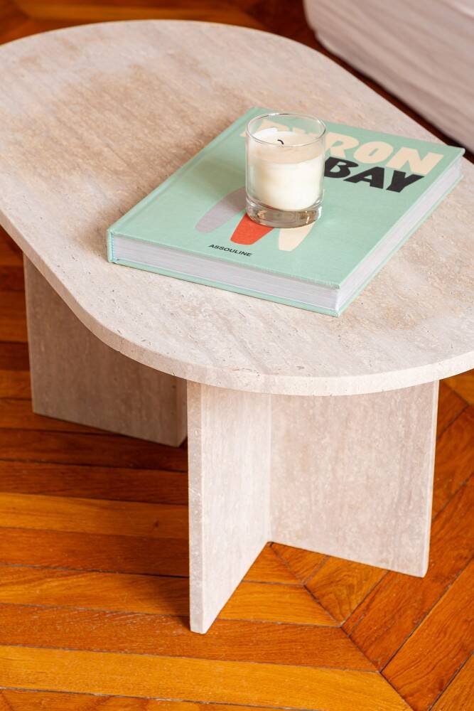 Oval coffee table in travertine