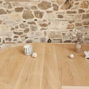 Round table in the style of Pierre Chapo.