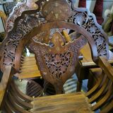 Pair of curule armchairs in solid teak circa 1980