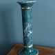 Column candle holder in ceramic with green and gold marble effect.