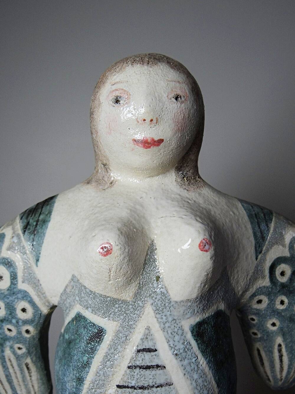 Vintage stylised mermaid ceramic wall sculpture from an art studio.