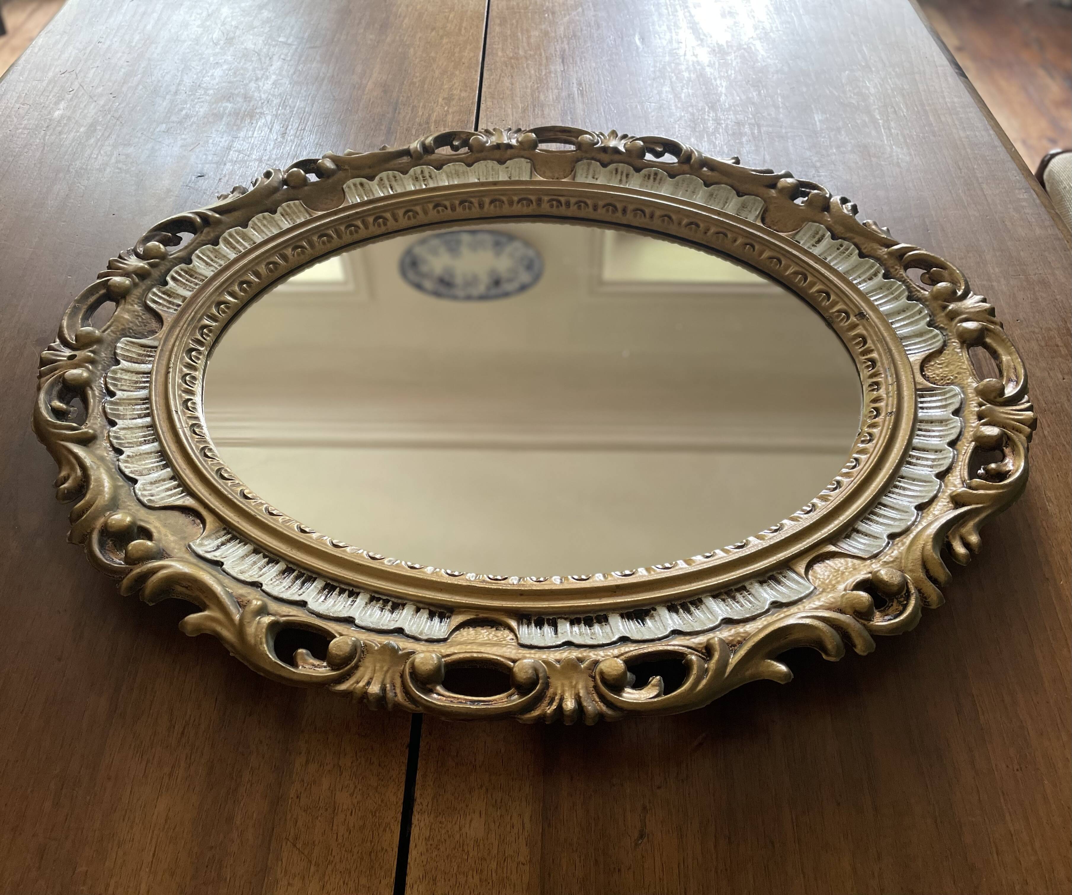 Kitsch 70s gold resin oval mirror
