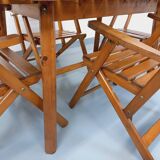 Vintage garden furniture set consisting of a table with extensions and 4 armchairs