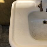 Antique washbasin on ceramic column