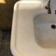 Antique washbasin on ceramic column