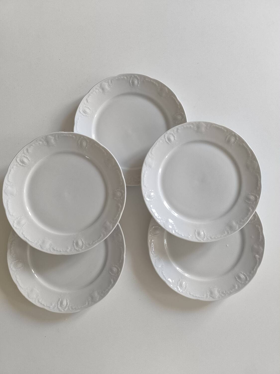 Set of five porcelain dessert plates