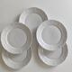 Set of five porcelain dessert plates