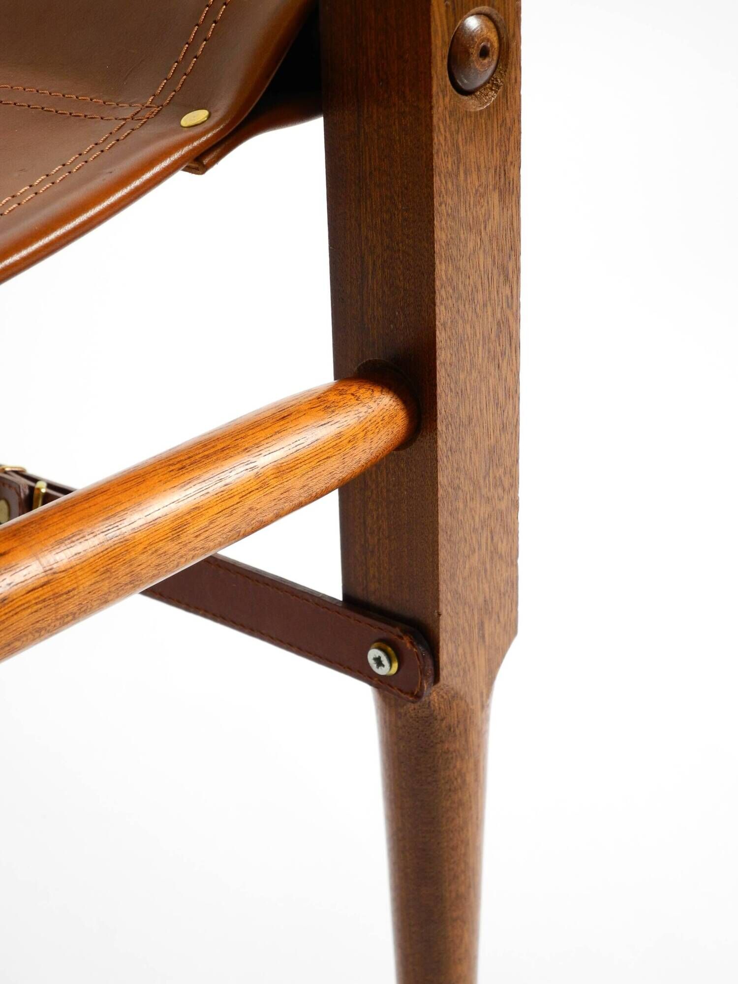 Rare 1990s safari stool with a teak frame and a seat made of brown saddle l