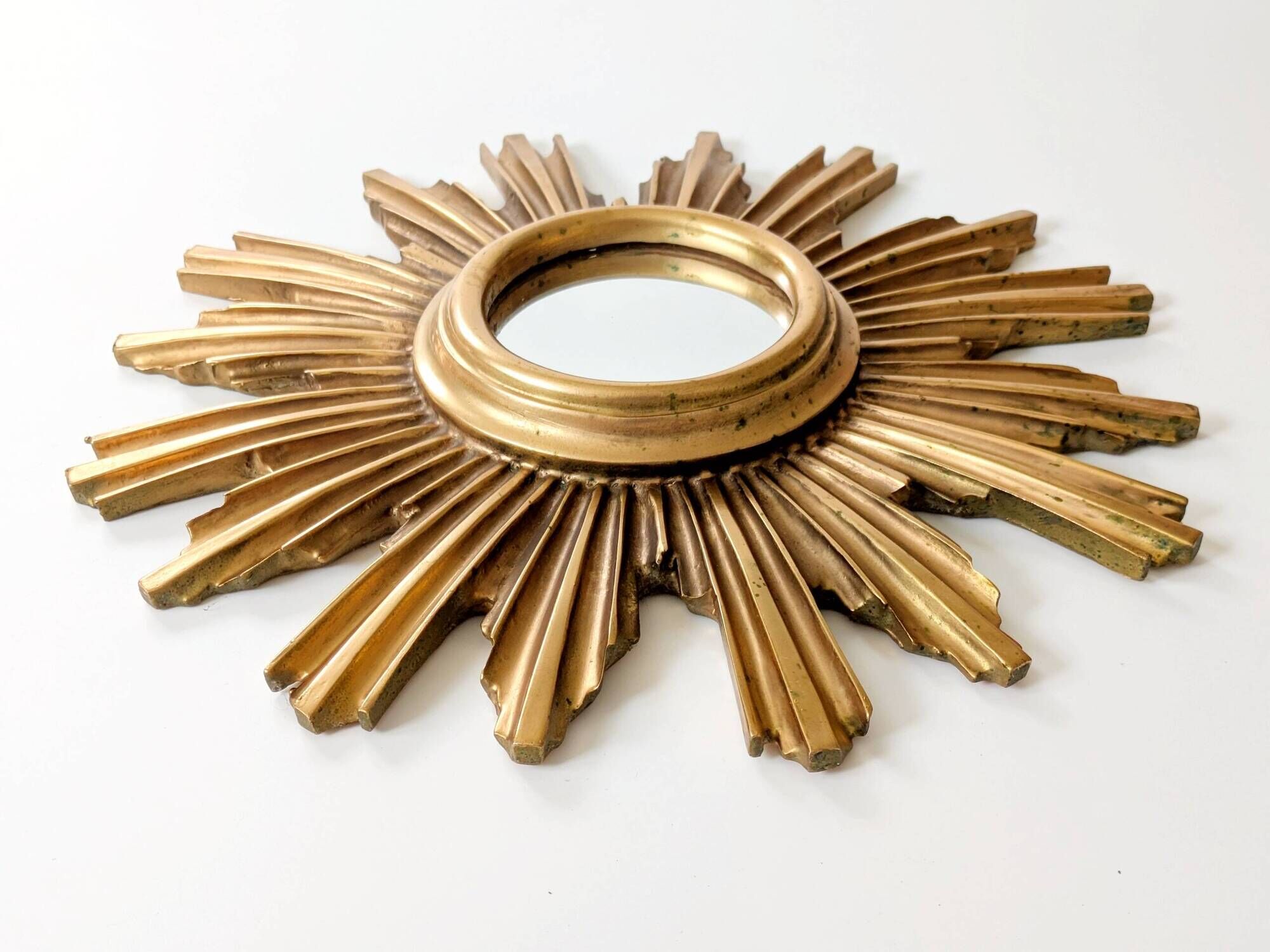 Vintage sunburst mirror in wood and gold resin, 1960s–70s