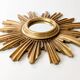 Vintage sunburst mirror in wood and gold resin, 1960s–70s