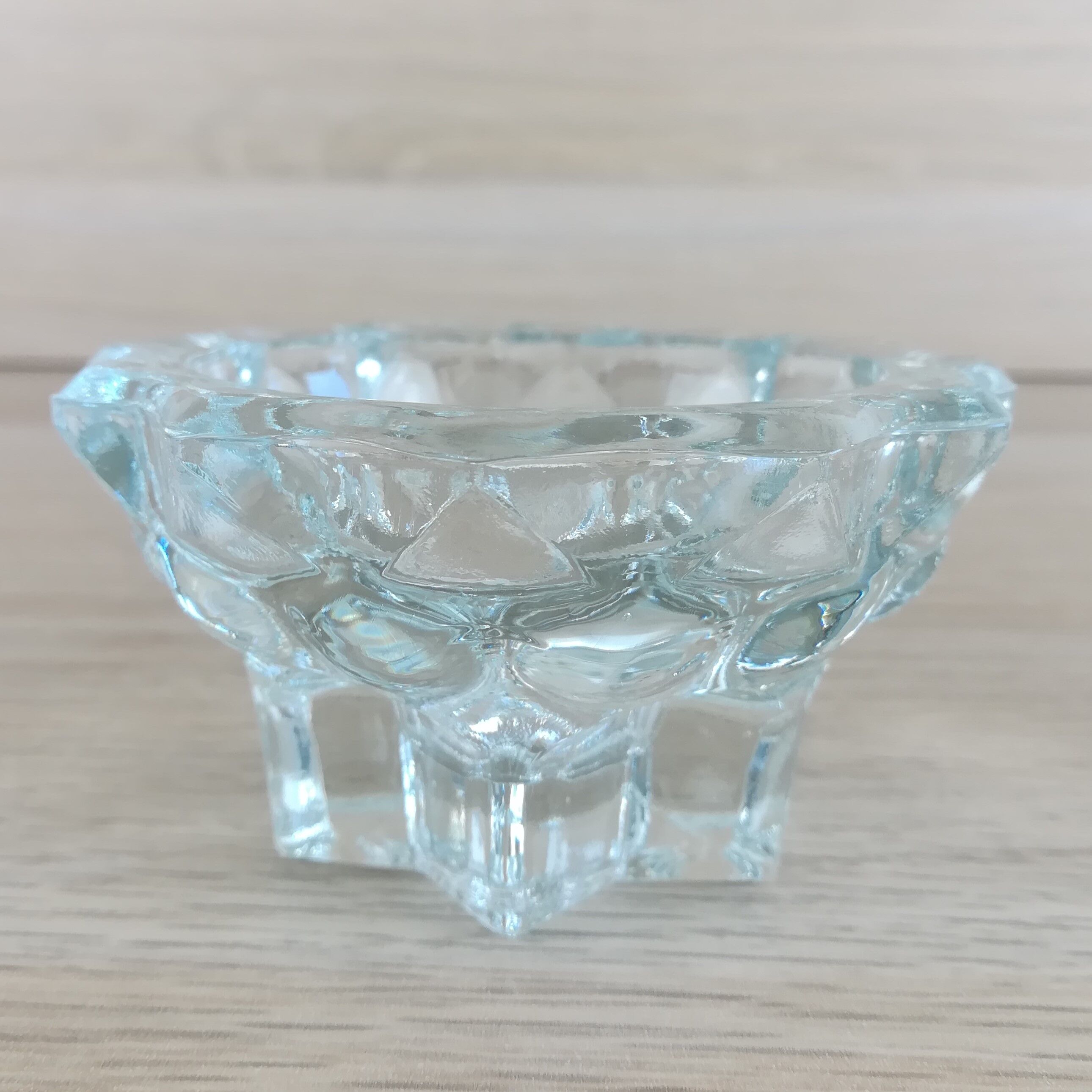 Pair of glass star candle holders