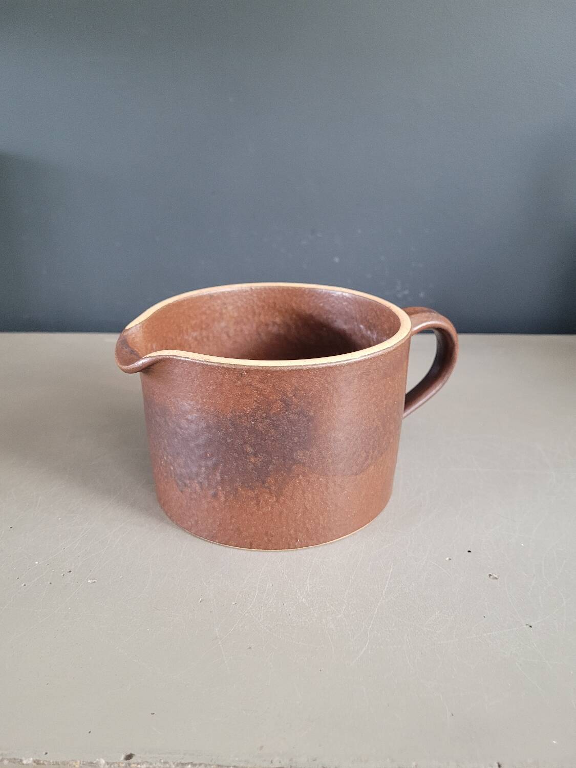 Pitcher - cream pot - in brown glazed earthenware