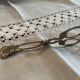 Sugar tongs or sweets in silver metal