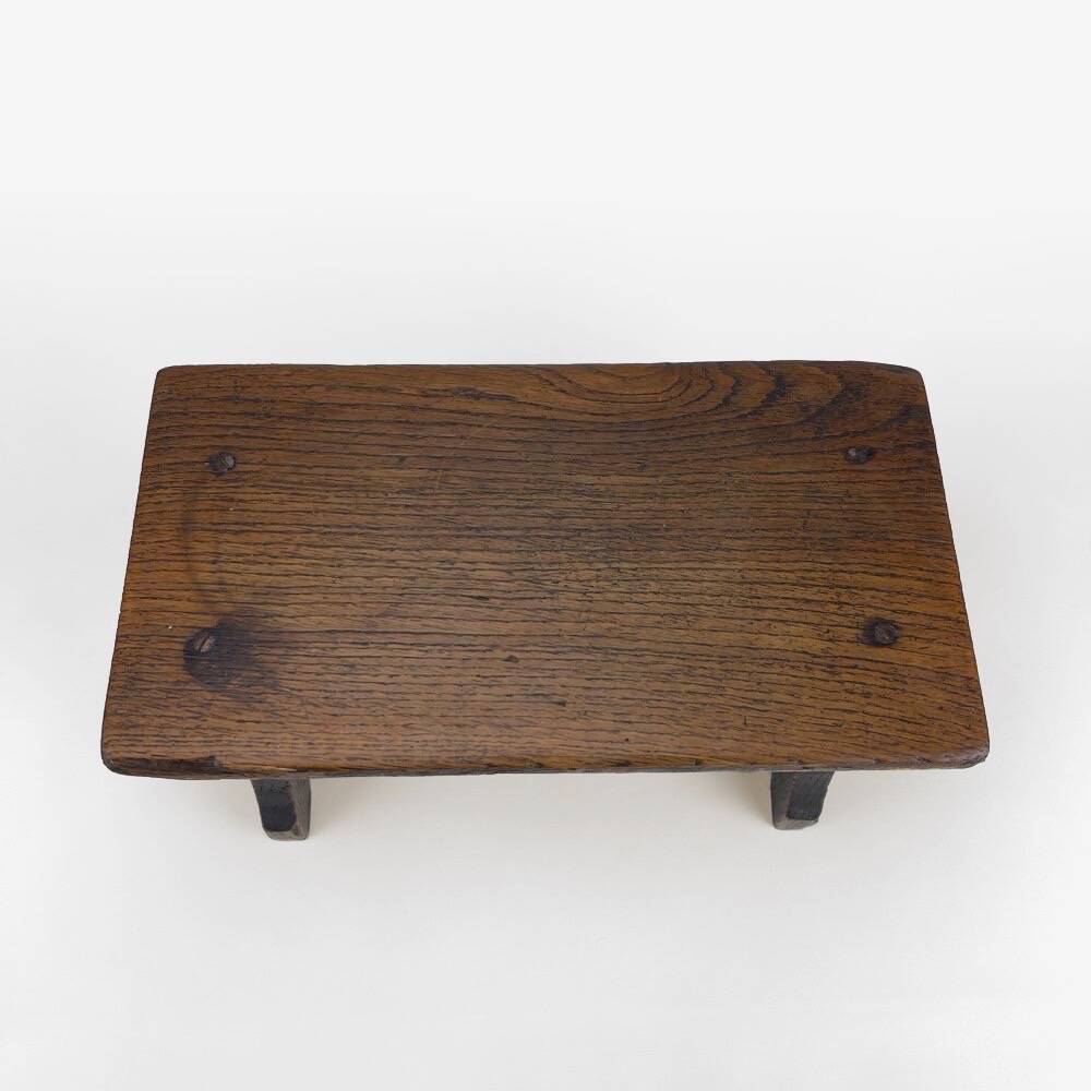 Small old wooden bench or footstool
