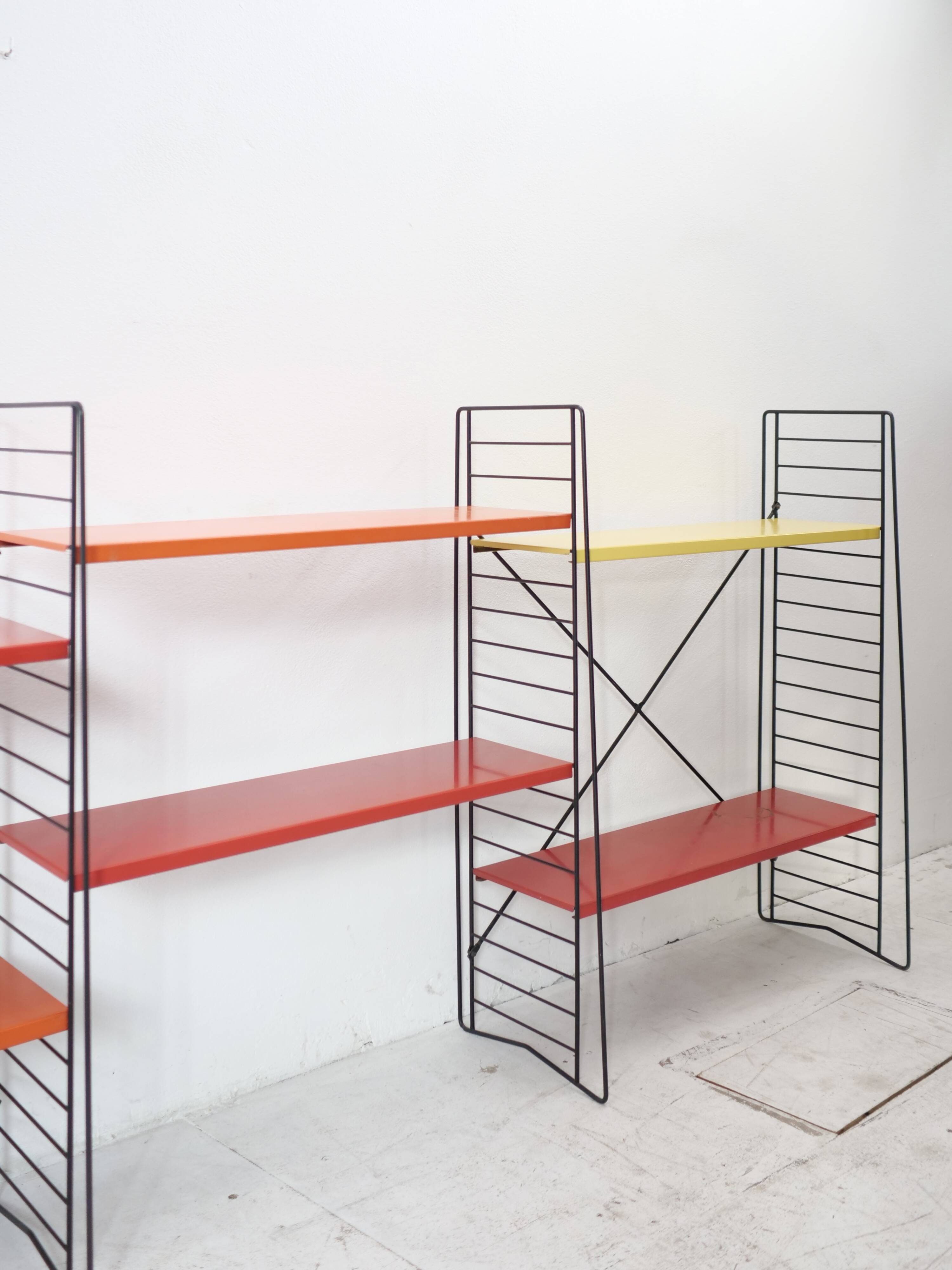 Tomado shelf in coloured metal floor shelves from 1958.