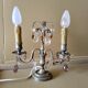 Pair of girandole lamps and silver metal