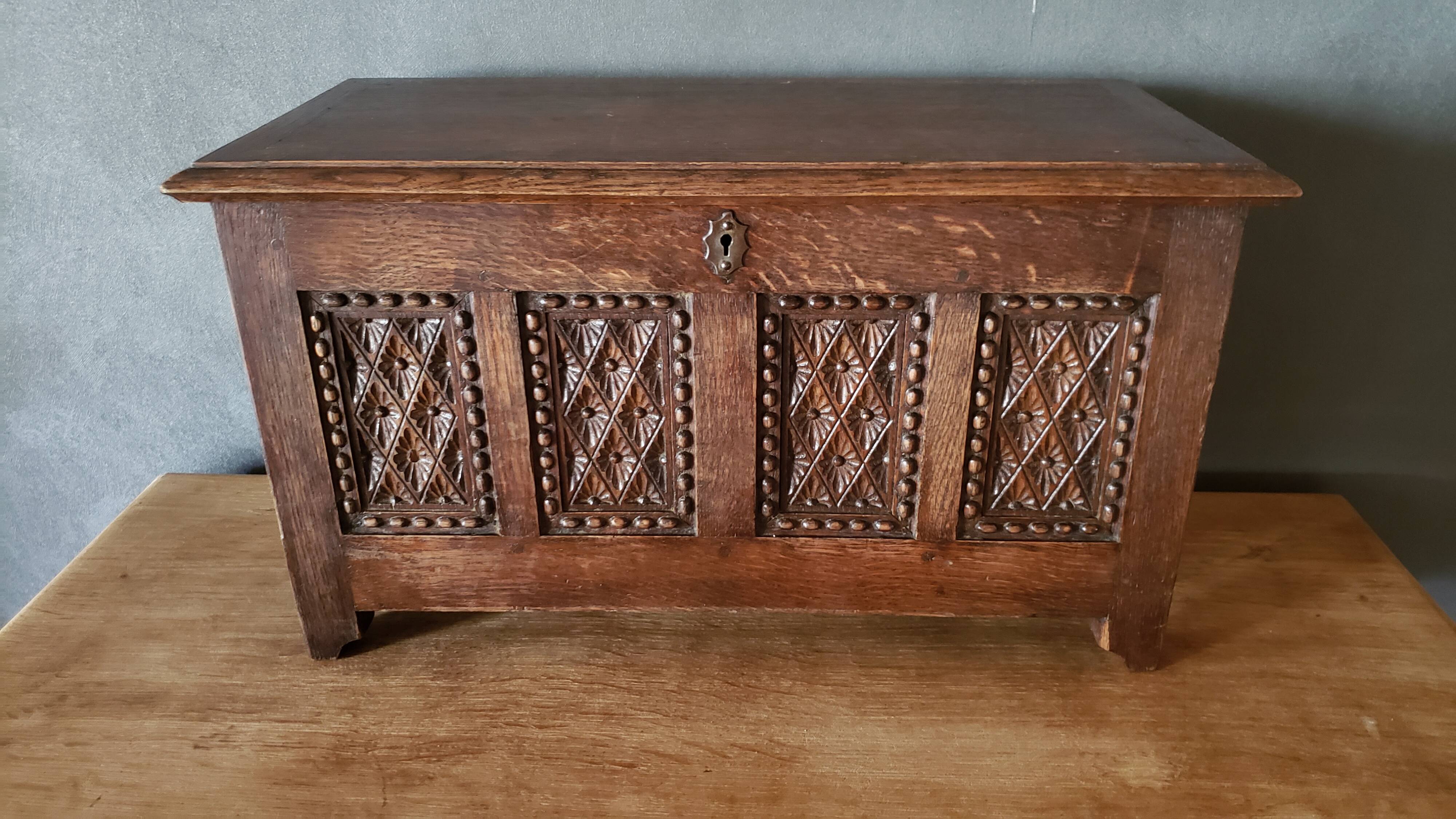 Mini carved oak chest