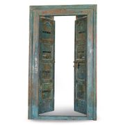 Porte en bois à la patine bleue