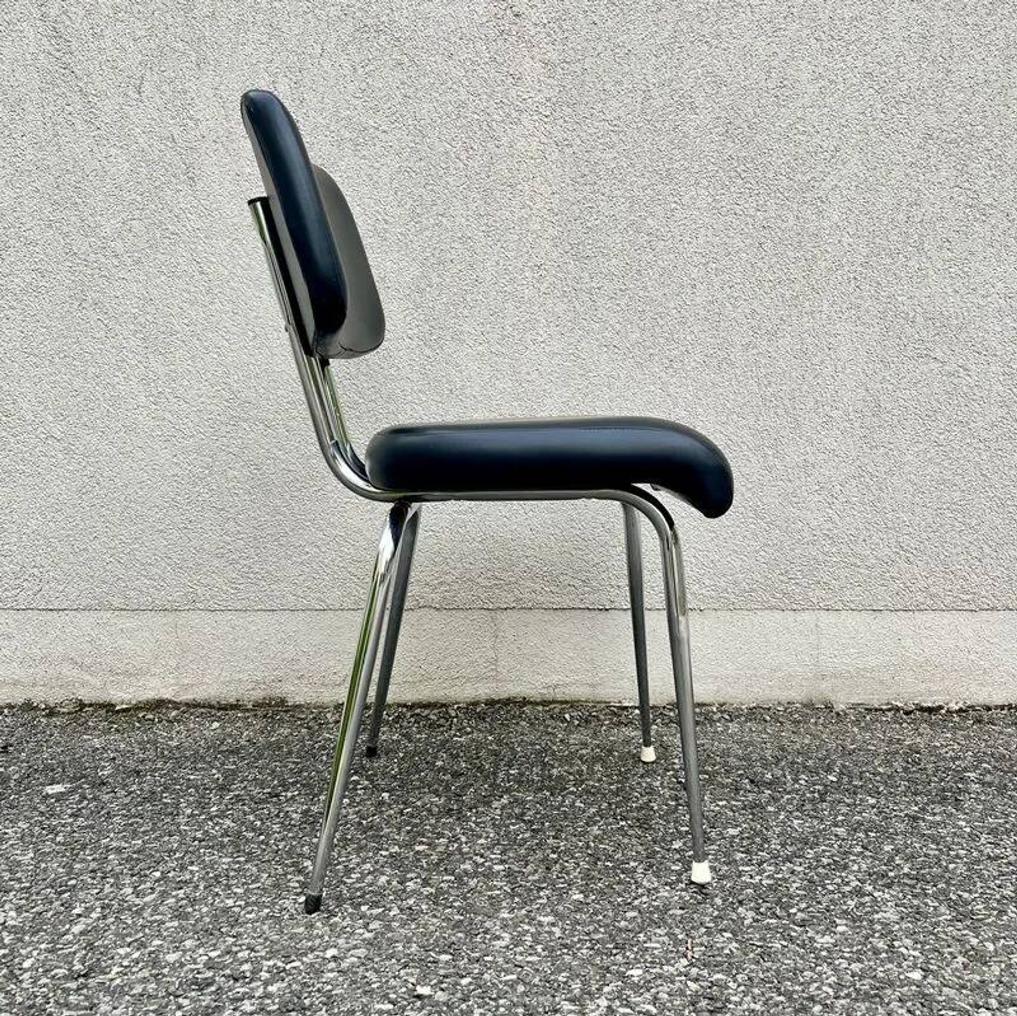 Black faux leather office chair