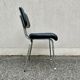 Black faux leather office chair
