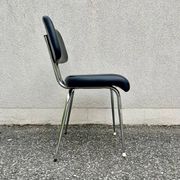 Black faux leather office chair