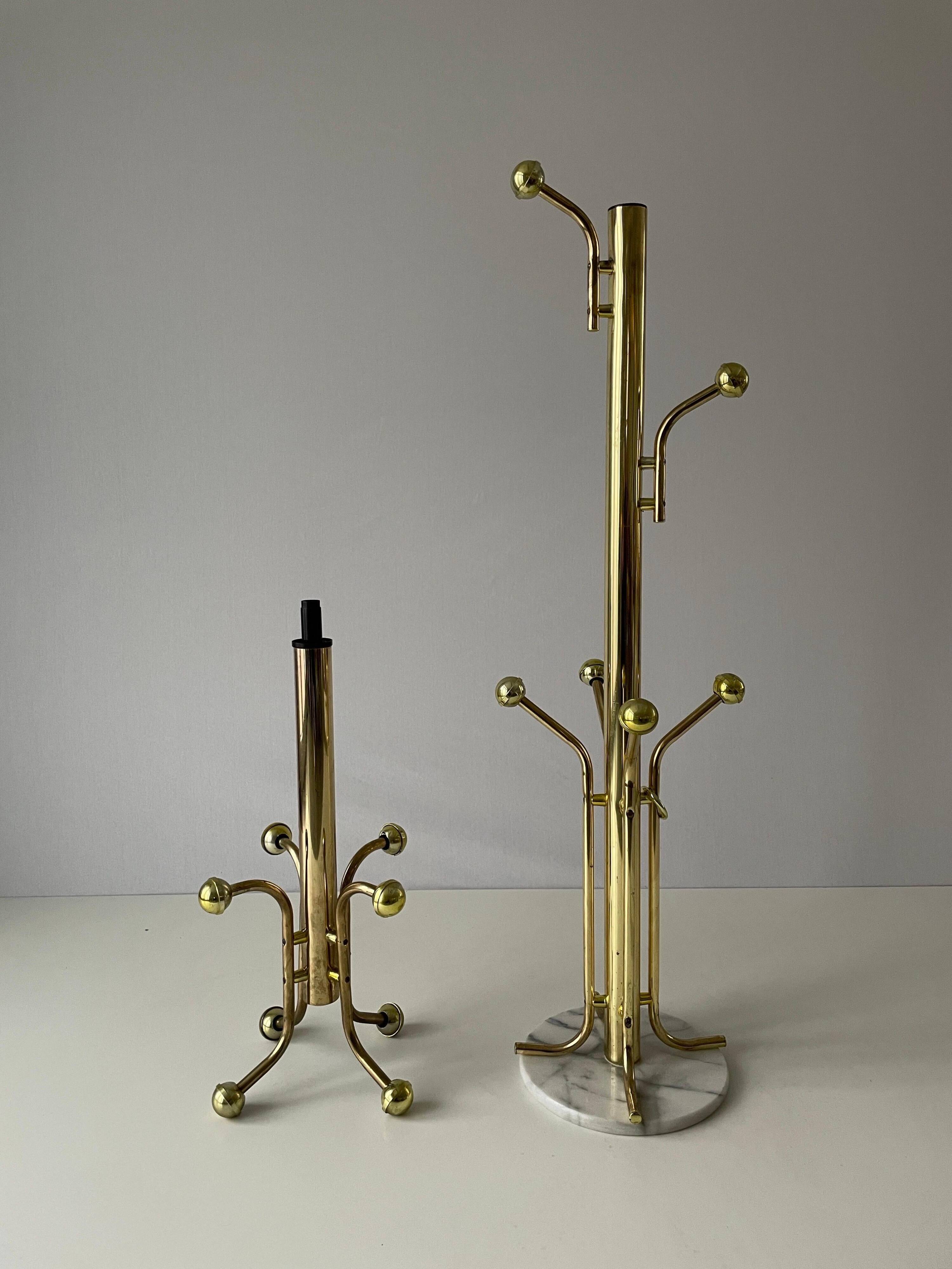 Free-standing coat rack in plexiglass with a marble base, 1960s, Germany.