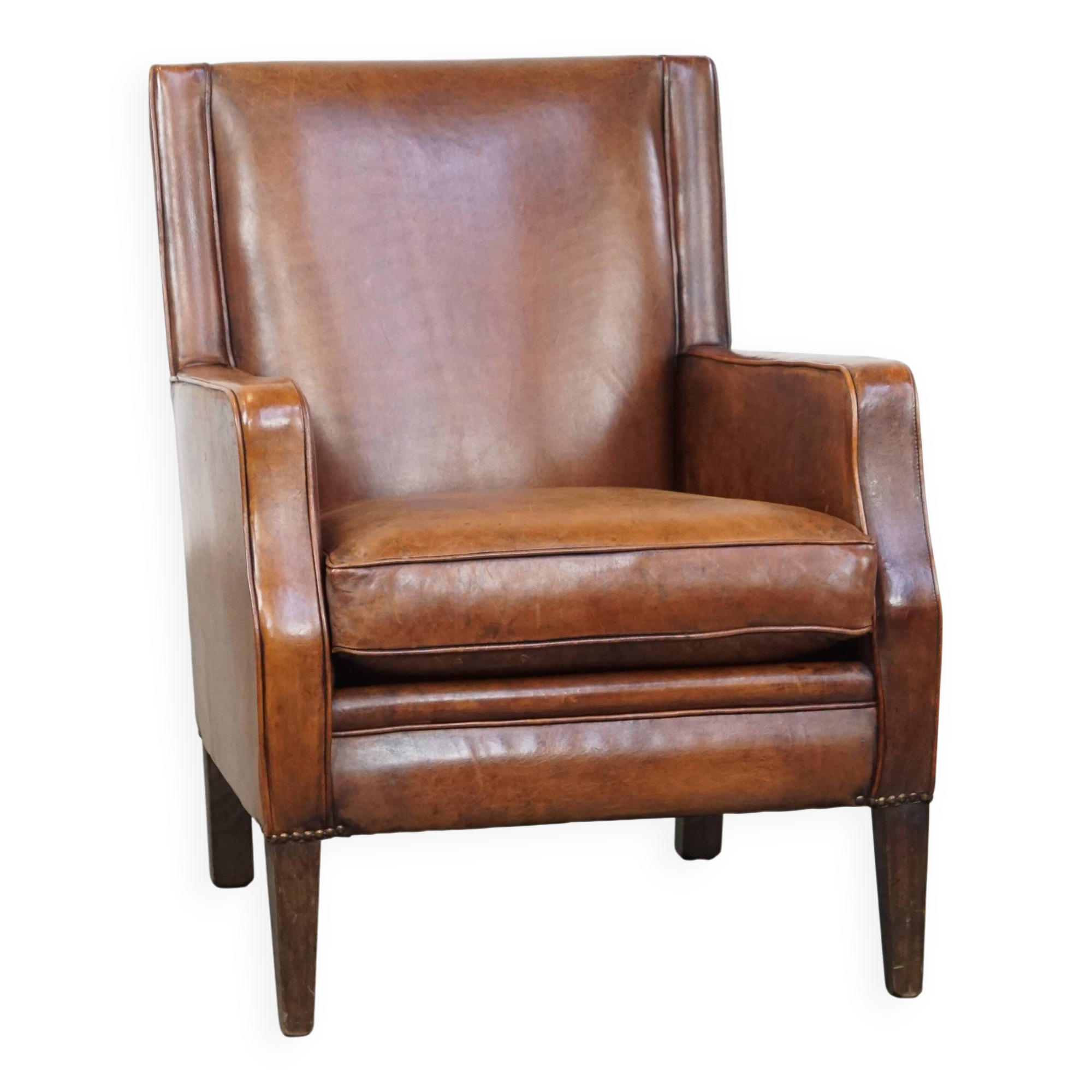 Fauteuil en cuir de mouton au design Art déco épuré