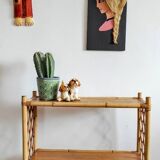 Blond rattan shelf